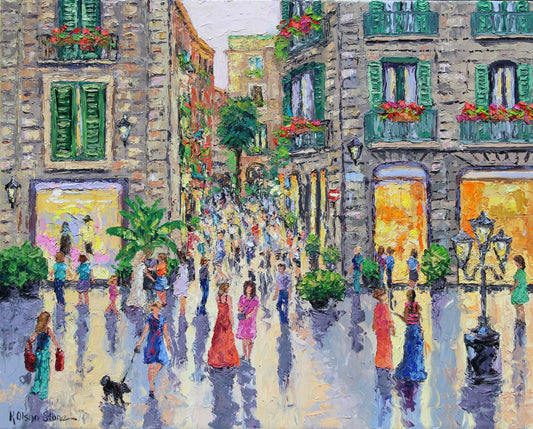 An oil painting depicting a bustling cityscape scene in Barcelona during an evening, with people strolling and the sun setting.  Wall decor for art collectors.