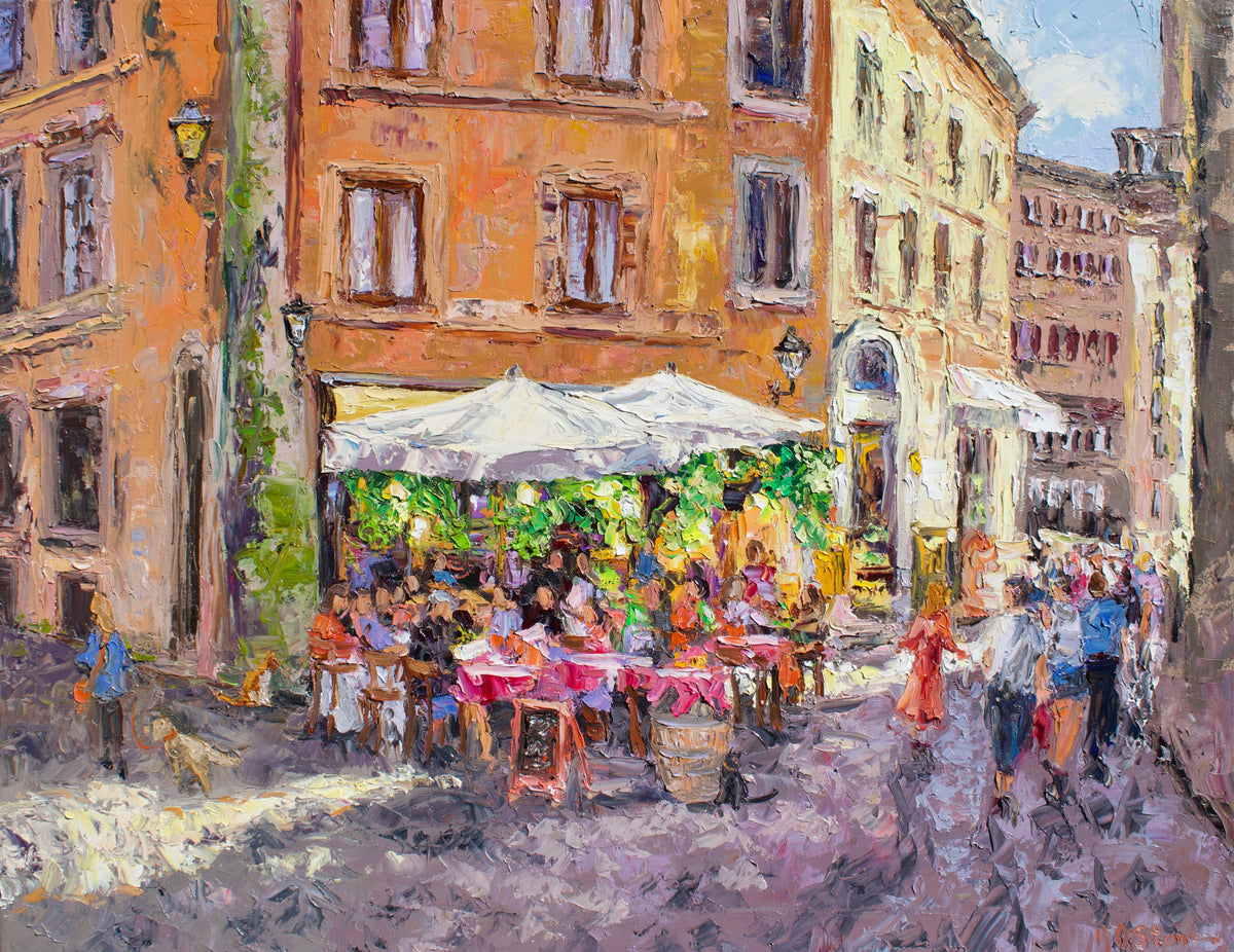Impressionist-style painting of a sunlit European street scene with warm orange and beige buildings, outdoor cafe tables under white umbrellas, greenery, and small figures of people walking and dining.