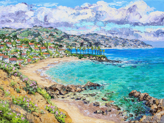 A textured oil painting of a Laguna Beach California sea cove and beach.  Sea rocks are visible in the shallow water of the cove, the colors of the water are turquoise and deep blue.  Houses line the hillside and the iconic Crescent Bay penninsula is visible in the distance.   Wall decor for art collectors.