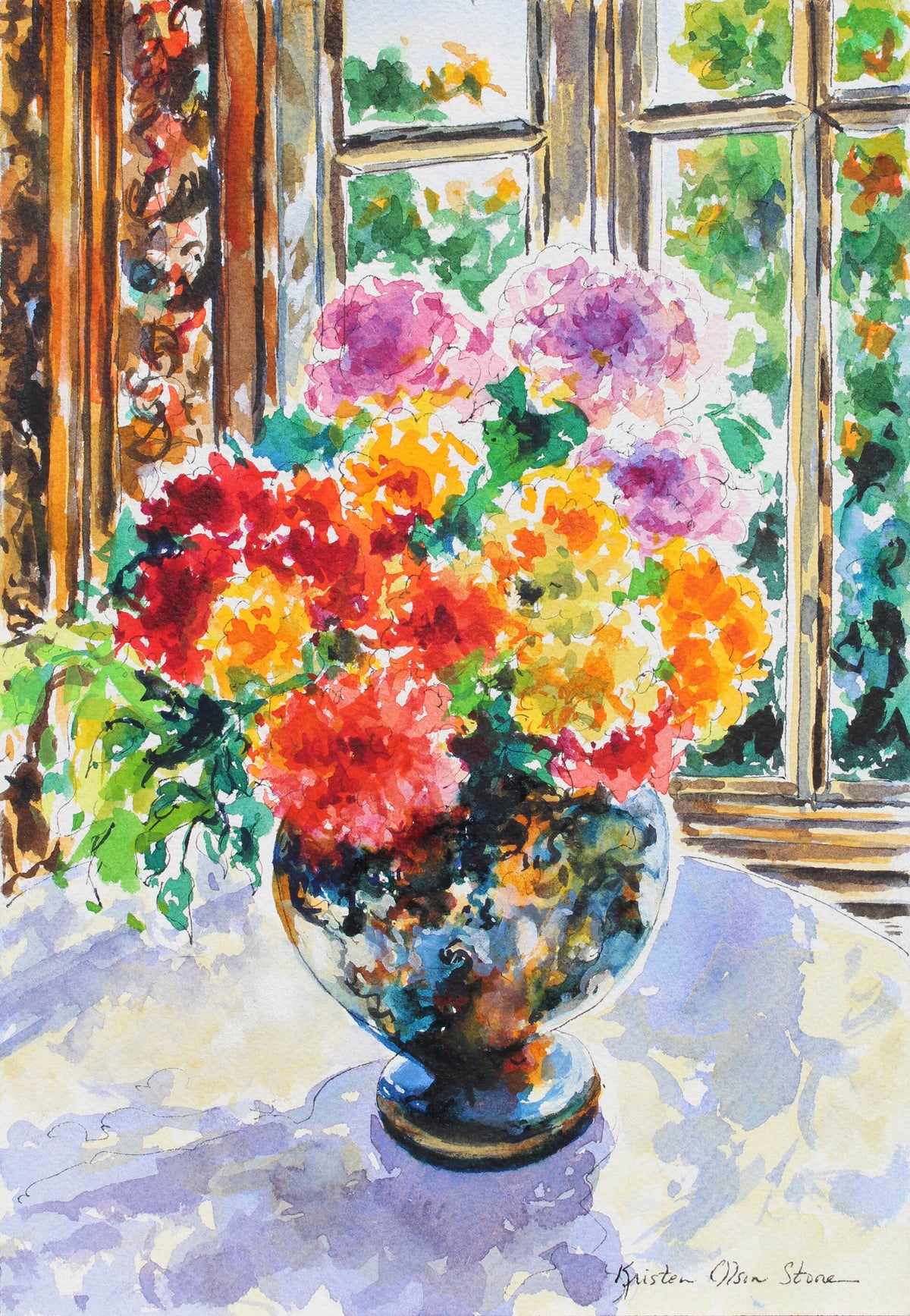 Colorful bouquet of flowers in a vase with a window in the background