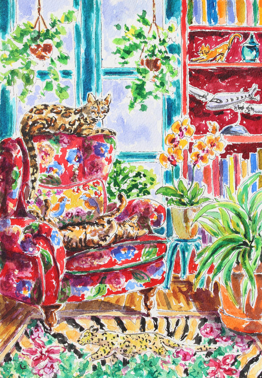 Commisioned painting or a colorful interior scene with a patterned armchair, cats, and a bookshelf.  Wall decor for art collectors