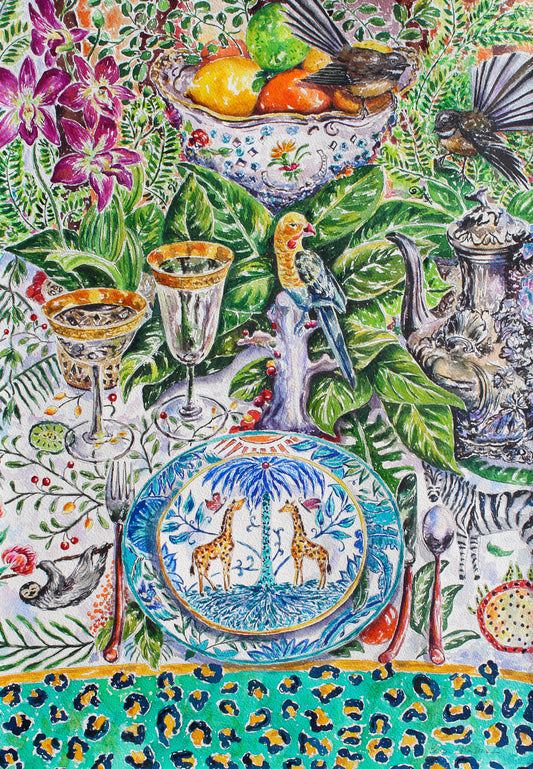 A large highly detailed watercolor of an intricate table setting.  Inlcuded are plates with giraffes, a table cloth with a sloth, a zebra, tropical fruits and foliage.  In the middle sits a china bird and some glass stemware. A silver teapot with flowers sits on the right side. Two piwakawaka birds or New Zealand fantails are perched at the top of the painting, they appear to have just landed on the scene.  fresh fruit is in a decorated bowl and purple orchids and magnolia leaves complet the scene.