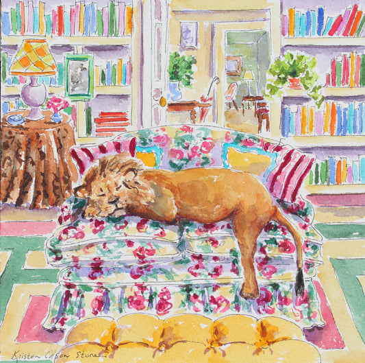 A colorful watercolor painting of a lion sleeping on a floral sofa in a book-filled living room. The artwork features a variety of bright colors and whimsical details, with the artist's signature 'Kirsten Olsen Stewart' visible in the lower-left corner.
