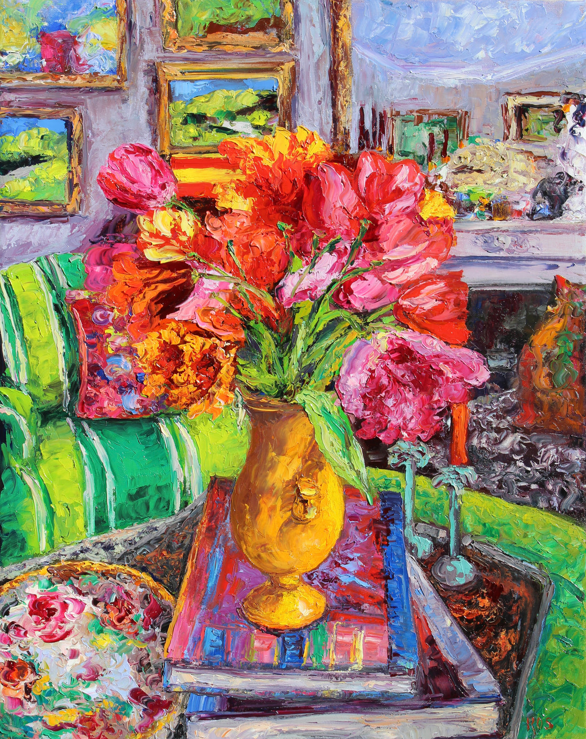 Colorful oil painting of a yellow vase filled with bright pink, red, orange, and yellow flowers, placed on a table in a vividly decorated room with green striped upholstery, framed art, and a window.