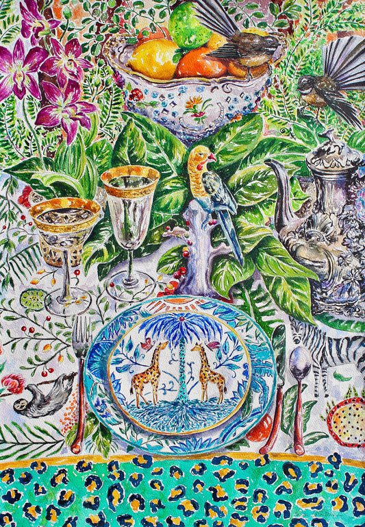 a limited edition print of New Zealand fantails landing on a beautiful table setting with exotic tablecloth and china. 2 Giraffes are on the plate, a sloth, a zebra and a china parrot.  There are also purple orchids, magnolia leaves and glassware and a metal tea pot.  The bottom has teal and yellow leopard print 