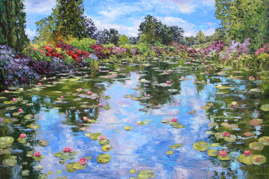 A large canvas painting featuring a vibrant depiction of water lilies on a pond with a clear blue sky and greenery in the background.